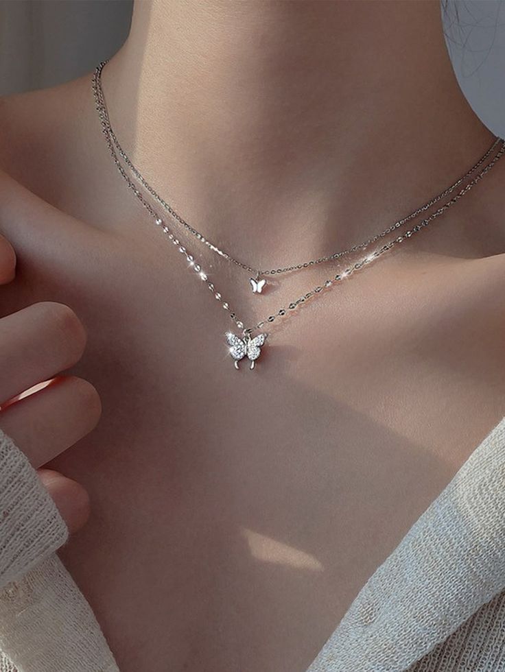 Color: Silver Gender: Women Material: Zinc Alloy Quantity: 1 piece Style: Fashionable Details: Rhinestone, Butterfly Type: Pendant Necklaces, Layer Sets Magnetic: No IN Length 13.8-17.7 This data was obtained from manually measuring the product, it may be off by 1-2 CM. قلادات متدلية, Pretty Jewelry Necklaces, Jewelry Accessories Ideas, Birthday Board, Aesthetic Stuff, Girly Accessories, Pointe Shoes, Classy Jewelry, Fancy Jewellery