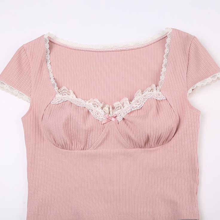 Get ready to feel feminine and romantic in our Rubie Short Sleeve Crop Top, part of our Good Girl Things collection. With delicate lace detailing and mini floral accents, this top offers a slim fit and French-inspired style. Perfect for those "good girl" vibes. Details Rubie Short Sleeve Crop Top in Pink Lace Detailed Mini Floral Detail Slim Fit French Style Feminine, Romantic Good Girl Things Shirts & Tops Collection Kawaii Fairycore, Y2k Outfit Ideas, Pink Lace Tops, Slim Fit Crop Top, Pink Doll, Summer Crop Tops, Lace Bows, Summer Party Dress, Short Sleeve Cropped Top