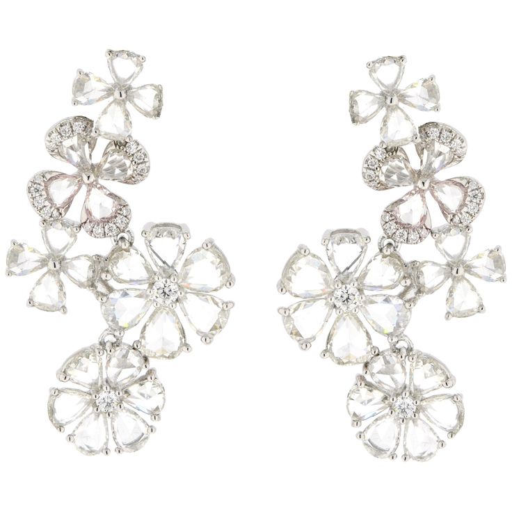 JR 7.73 carats Rose Cut Diamond Flower 18 karat White Gold Earring Flowers made of rose-cut diamonds is what dreams are made of. This rose-cut diamond flower earring looks nothing less than a dream. Its beauty is unmatched for. Diamond Weight : 7.73 carats Length approx : 3.75cm Addition details or Video upon request. White Gold Earring, Butterfly Earrings Gold, Art Jewelry Design, Flower Earring, Titanium Earrings, White Gold Necklaces, Fancy Diamonds, Stylish Earring, White Gold Earrings