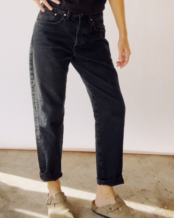 Our newest silhouette in washed black! This is your everyday all day kind of jean. Super easy and comfy with that perfect slouch. These are a mid rise relaxed jean designed to sit a little below your natural waist. A roomy leg that has a slight taper and hits right around your ankle. Great worn uncuffed or cuffed. 100% Cotton 13 oz. denim Made in Los Angeles Size Tip: If you're in between sizes we suggest sizing down one size. Model is 5'5", size 25 and wearing a 25 Camilla Dress, Relaxed Jeans, Mid Rise Jeans, Designer Jeans, Engineered Garments, Crop Tee, Slow Fashion, Mid Rise, Denim Women