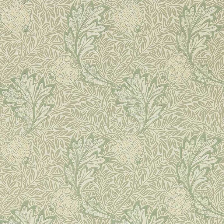 a green and white floral wallpaper with leaves on the side, in an ornate pattern