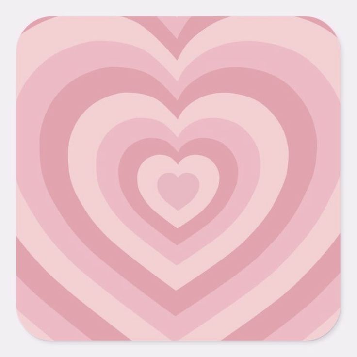 a pink and white heart pattern on a square sticker with the shape of a heart