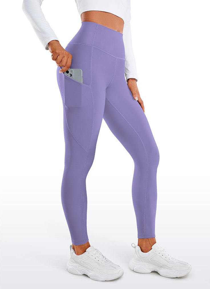 Keep moving in the cold with the Fleece Lined Collection Leggings. These leggings are soft, and the fleece lining interior & smooth, fast-drying exterior can retain body heat and keep warm in chill days. Deep side pockets can hold your phones and other belongings. Feature & Fitting: 
 Thermal Fleece Lined collection 
 Design for Multiple 
 High Waist, 28 inches 
 Interior Drawstring 
 Side Pockets 
 Fabric: 
 Thermal fleece lined, ideal for winter 
 Slick finish, brick the wind and keep Functional Solid Color Leggings With Comfort Waistband, Functional Solid Leggings With Comfort Waistband, Functional Full-length Tights With Pockets, Winter Workout Full Length Activewear, Breathable Comfort Stretch Full-length Leggings, Breathable Full-length Comfort Stretch Leggings, Breathable Full Length Comfort Stretch Leggings, Tight Fit Activewear With Pockets, Sporty Full-length Leggings With Side Pockets