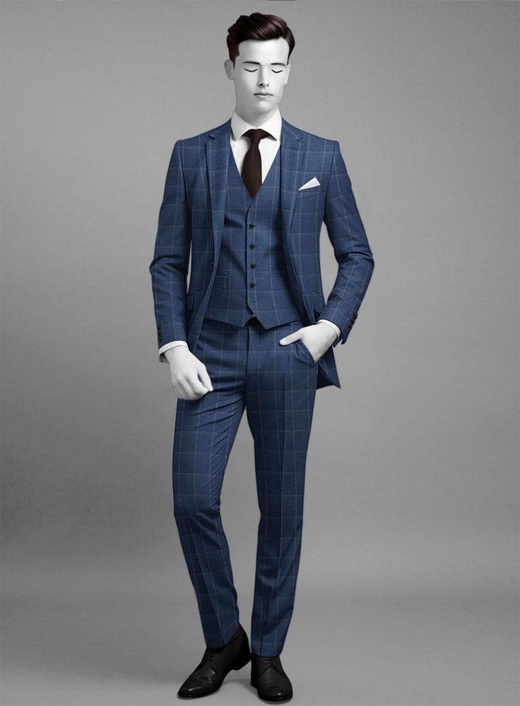 Channel effortless charm with our Napolean Noemi Windowpane Blue Wool Suit, offering a modern interpretation of classic sophistication. Expertly tailored from a luxurious wool blend, its rich blue hue exudes versatility and refinement. The intricate texture of the fabric adds depth and dimension, while the sleek silhouette ensures a sharp, polished appearance. From upscale soirées to formal business meetings, this suit exudes confidence and sophistication, guaranteeing you leave a lasting impression wherever you go.  Look Includes    Napolean Noemi Windowpane Blue Wool  Fabric  Two Button Jacket Style  Notch Lapel  Horn Royal Black Buttons  Single Vent  Three Cuff Buttons  Two Welted Back Pockets on Trousers   Click 'Customize Now' to modify the look if needed.  Lining: Viscose, Dry Clean, Tailored Blue Three-piece Business Suit, Blue Wool Three-piece Suit With Notch Lapel, Blue Wool Three-piece Suit With Pressed Crease, Elegant Blue Three-piece Suit For Semi-formal Occasions, Elegant Blue Semi-formal Three-piece Suit, Classic Royal Blue Three-piece Suit For Formal Occasions, Classic Royal Blue Three-piece Suit For Semi-formal Occasions, Classic Royal Blue Three-piece Suit For Semi-formal Events, Timeless Blue Formal Suit