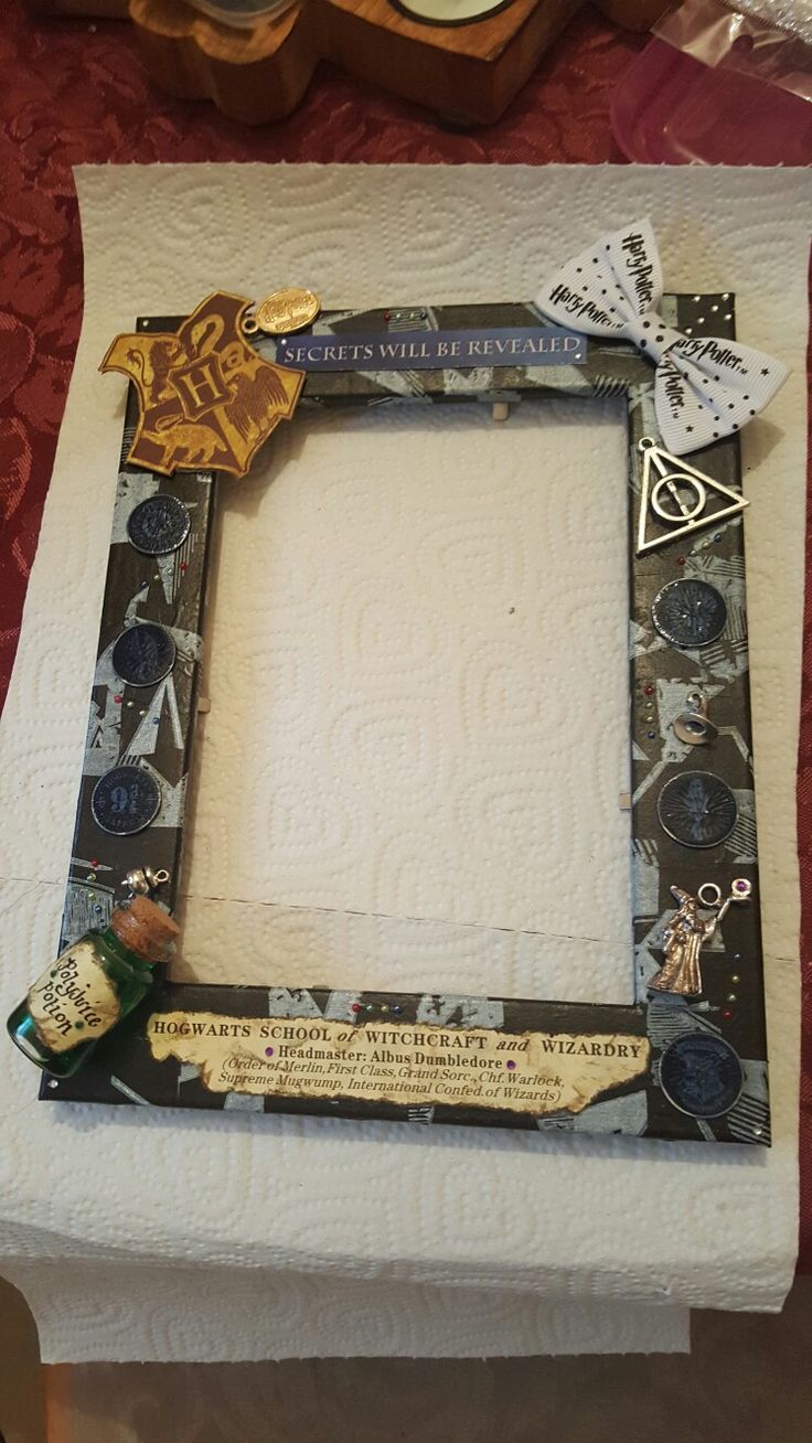 an altered picture frame is sitting on a table