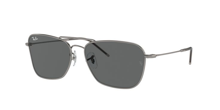 Ray-Ban Caravan Reverse glasses are a unique blend of style and performance. The square shape and polished gunmetal finish of the metal frame give these shades a sleek, modern look. The dark grey lenses add a touch of sophistication to your ensemble, while providing optimal protection. These shades are not just stylish but versatile as well. Modern Silver Sunglasses For Outdoor, Modern Silver Aviator Sunglasses With Uv Protection, Modern Silver Aviator Sunglasses With Gradient Lenses, Modern Silver Aviator Sunglasses With Mirrored Lenses, Modern Silver Sunglasses With Uva Protection, Modern Gray Aviator Sunglasses With Gradient Lenses, Modern Silver Aviator Sunglasses For Outdoors, Modern Silver Aviator Sunglasses For Outdoor, Modern Silver Aviator Sunglasses