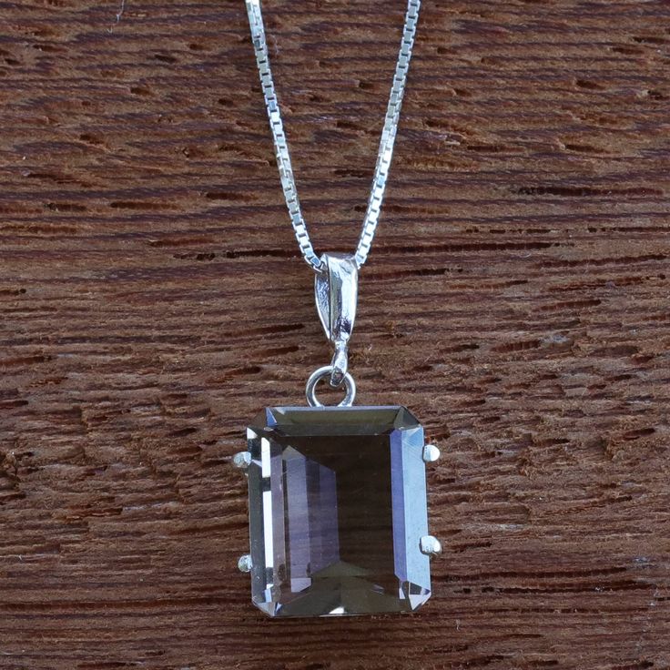 Square-cut smoky quartz is dazzling as it nestles in a sterling embrace. By Liliam Vivan, the four-carat Brazilian gemstones poses in a sterling silver necklace to bring elegance to any outfit. Smoky Quartz Pendant, Quartz Pendant Necklace, Square Cut, Quartz Pendant, Smoky Quartz, Sterling Silver Necklace, Sterling Silver Necklaces, Jewelry Necklace Pendant, Silver Necklace