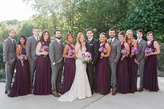 a bride and groom with their bridal party