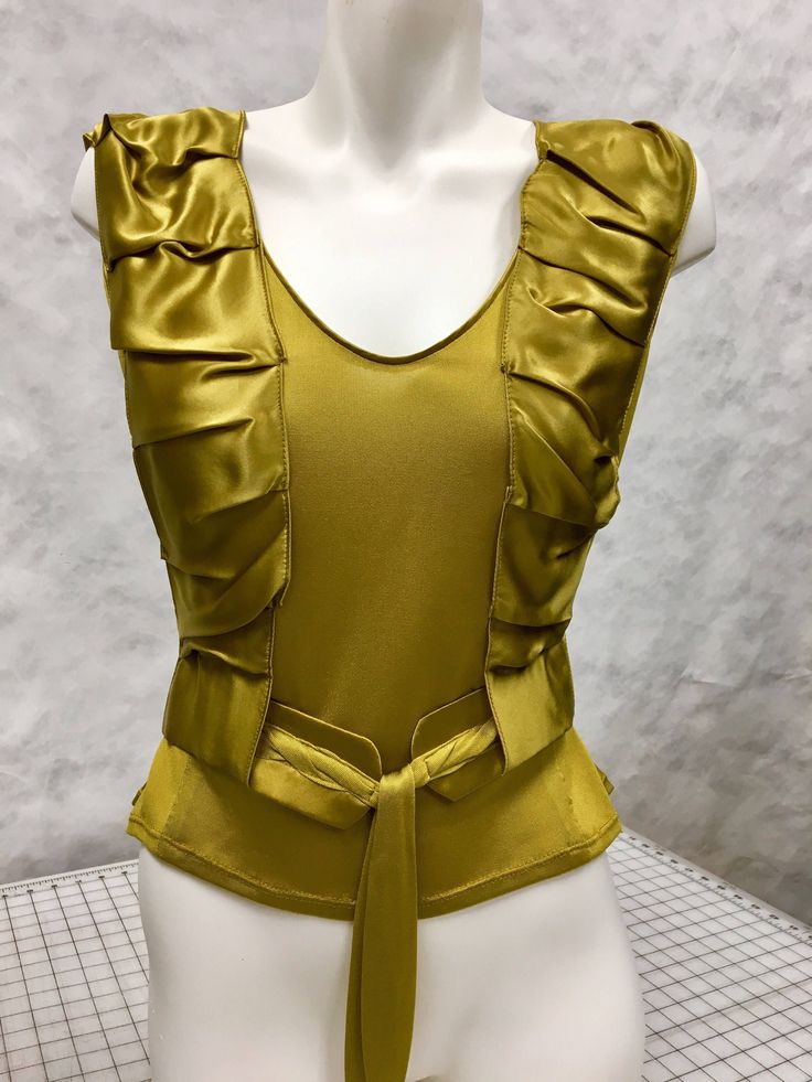 Golden mustard color silk jersey and charmeuse top.  100% silk.  Wide shoulder silk jersey tank top with draped silk charmeuse harness straps that hold braided belt.  Incredibly soft and luxurious fabrics and rich vibrant color.  Soft shape.  Available 2 only in sizes 6 and 8.  Ask us about final sale discount option. Gowns For Girls, Mustard Color, Braided Belt, Silk Charmeuse, Cute Fits, Evening Dresses Prom, Luxury Women, Silk Top, Luxury Fabrics