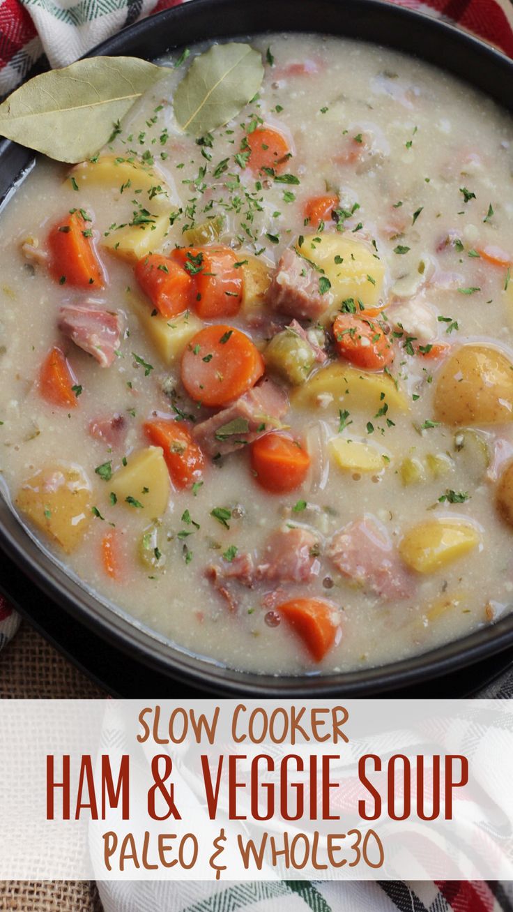 slow cooker ham and veggie soup in a black bowl