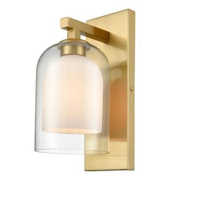 a wall light with a glass shade on it