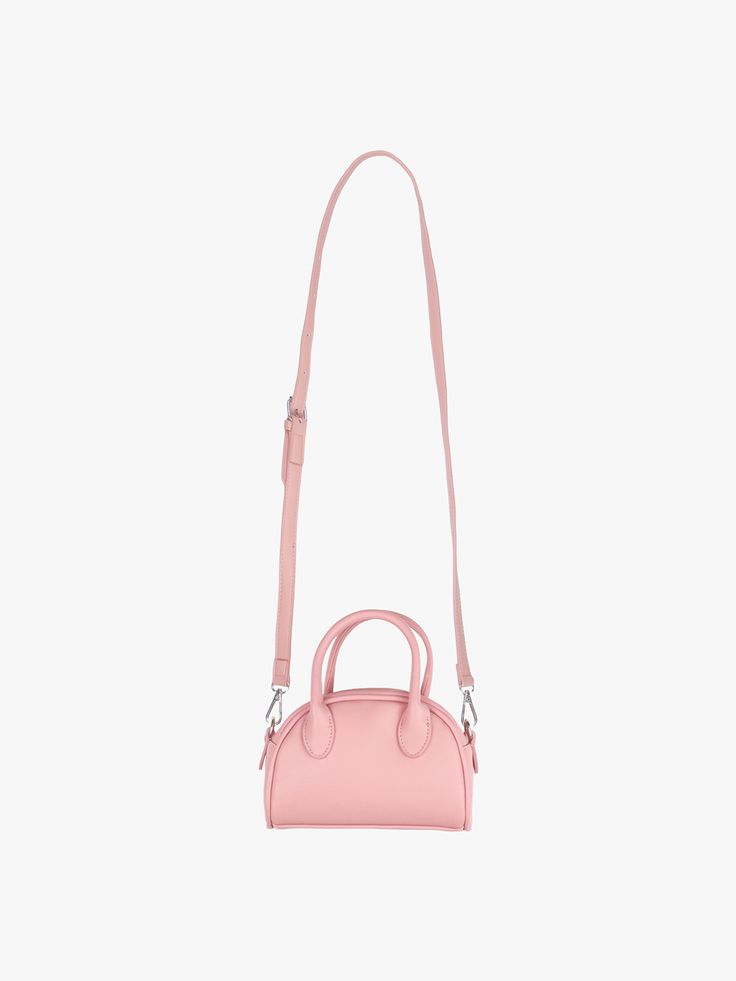 Editor's NotePINK PINEAPPLE is a brand that embodies the kitsch & lovely mood with an easy, comfy, and chic design.- Half moon shaped mini bag- Can be worn as a tote or a cross bag- Luxurious matte surface point- Compact size yet spacious itemMeasurements(in.)- Size: 7.09 in. * 5.51 in. * 5.91 in.- Handle: 3.54 in.- Strap: 41.73 in. ~ 44.49 in. Composition & Care- 100% Polyurethane- Stay away from the heatDesigner- by PINK PINEAPPLE Pink Shoulder Bag With Removable Pouch And Round Handle, Pink Shoulder Bag With Round Handle And Removable Pouch, Pink Handheld Satchel For Daily Use, Pink Handheld Bag For On-the-go, Pink Bags With Detachable Strap And Round Handle, Pink Bag With Detachable Strap And Round Handle, Trendy Pink Satchel For On-the-go, Chic Pink Handheld Satchel, Feminine Pink Satchel With Detachable Handle