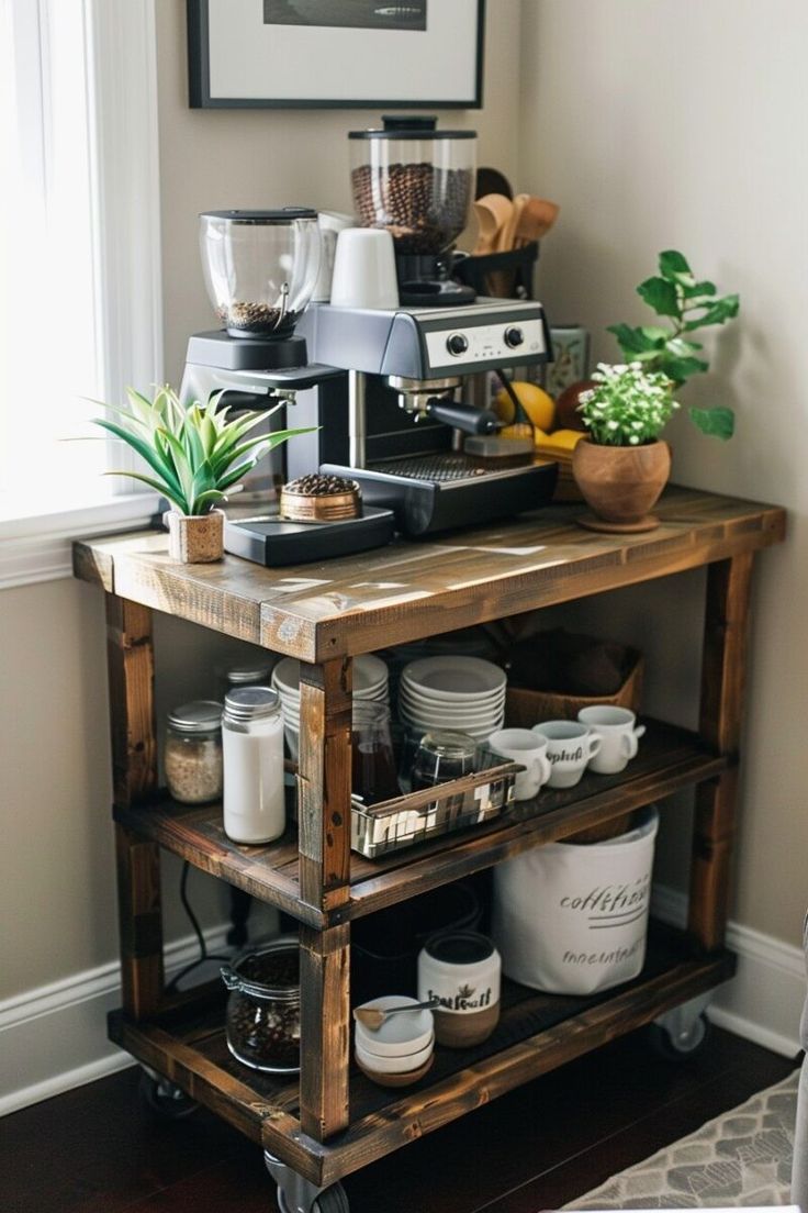 a coffee maker sitting on top of a wooden cart