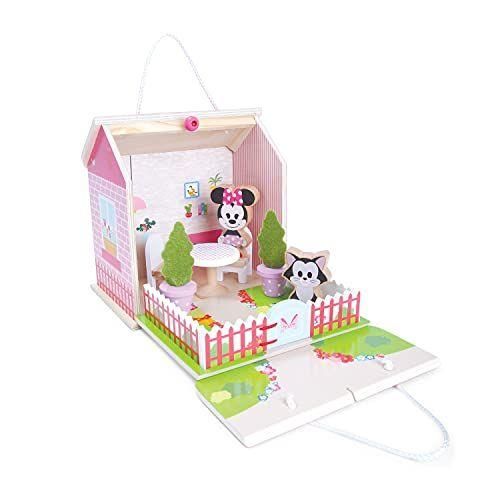 a paper cutout of a house with minnie mouse and her dog in the front