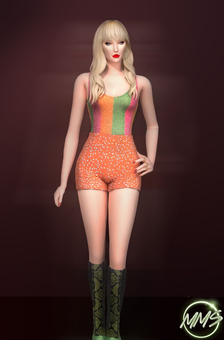 a woman in an orange and green bodysuit posing for the camera with her hands on her hips