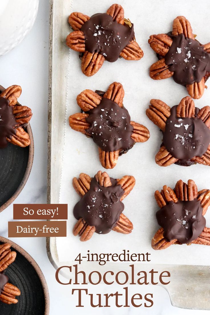 chocolate turtle cookies on a baking sheet with text overlay that reads, so easy dairy - free 4 - ingredient chocolate turtles