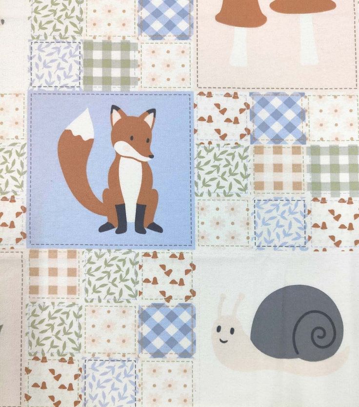 an image of a quilt with animals on it