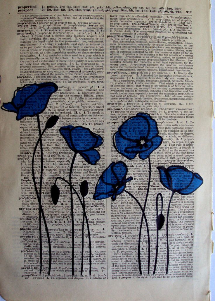 an old book with blue flowers on it