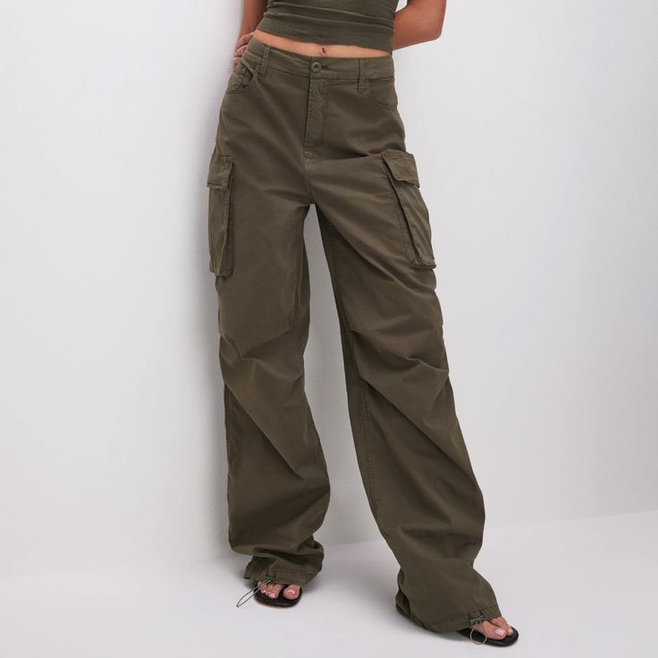 Good American Olive Green Colored Baggy Cargo Pants. Oversized Fit Baggy High Waist Khaki Wide Leg Pants, Spring Baggy Wide-leg Cargo Pants, High Waist Baggy Khaki Cargo Pants, Khaki High-waist Baggy Cargo Pants, Baggy High Waist Khaki Cargo Pants, Baggy High-waist Khaki Cargo Pants, Loosely Fitted Cargo Style Wide Leg Parachute Pants, Loosely Fitted Wide Leg Cargo Parachute Pants, Baggy Green Wide Leg Pants With Cargo Pockets