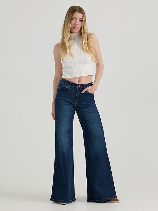 When you’re in the mood for drama, our Women’s Wide Leg Jean will hit the mark. It features the flattering high-rise you know and love, with a wide leg for a relaxed feel. It comes with the five-pocket styling, our signature “W” pocket stitching, a logo patch, and branded hardware. Be warned—you'll want to wear them with everything. Wrangler Flare Jeans, High Rise Dark Wash Flare Jeans With Button Closure, Cheap Dark Wash Flare Jeans With Button Closure, Mid-rise Medium Wash Flare Jeans With Belt Loops, Mid-rise Flare Jeans With Belt Loops In Medium Wash, Denim Jacket Sherpa, Wrangler Jeans Women's, Non-stretch Wide Leg Flare Jeans With Button Closure, Wrangler Pants