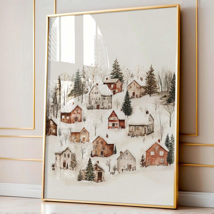 a painting on the wall in front of a window with snow covered houses and trees