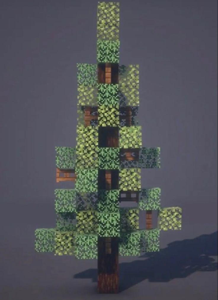 a tree made out of green leaves on a gray background