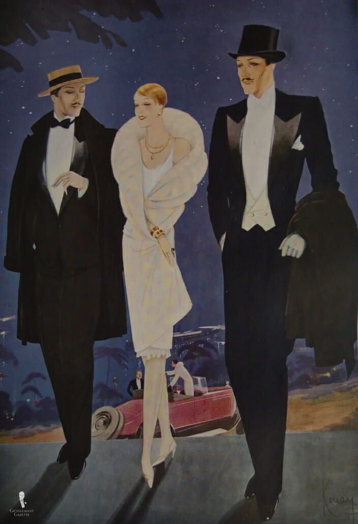 two men in tuxedos are standing next to a woman