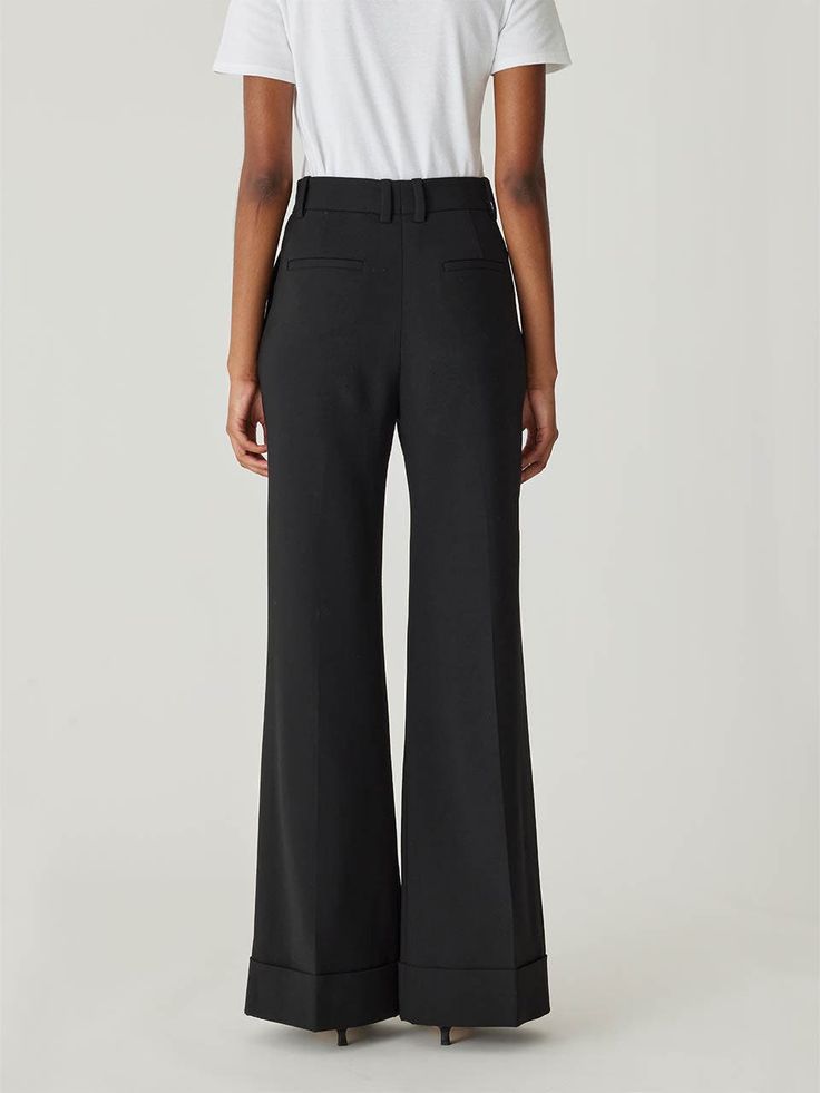 Featuring a high waist, sophisticated wide-leg silhouette, and chic cuff details, these trousers offer a polished and elegant look. High waist Wide-leg silhouette Chic cuff details 41% Wool, 52% Polyester, 4% Elastane, 3% Polyamide Dry Clean Only Chic Black Wide Leg Pants With Pressed Crease, Flared Wide Leg Pants With Pressed Crease For Work, Luxury Wide Leg Dress Pants, Luxury Wide Leg Pants For Workwear With High Waist, Luxury Wide Leg Pants With High Waist For Workwear, Black Flare Wide Leg Pants For Office, Black Flared Wide Leg Pants For Formal Occasions, Chic Formal Wide Leg Pants With Structured Boning, Classic Wide Leg Flare Pants With Pressed Crease