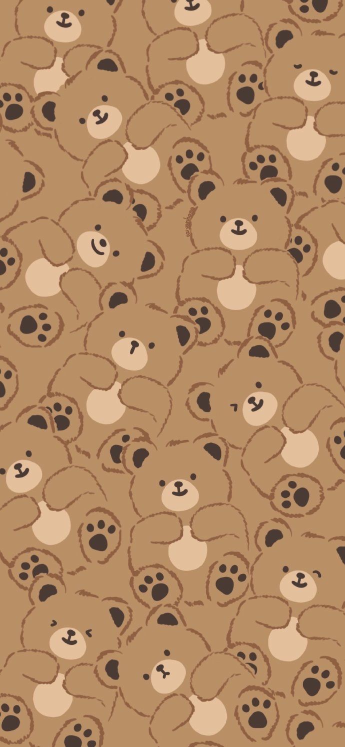 a brown bear pattern with black spots on it