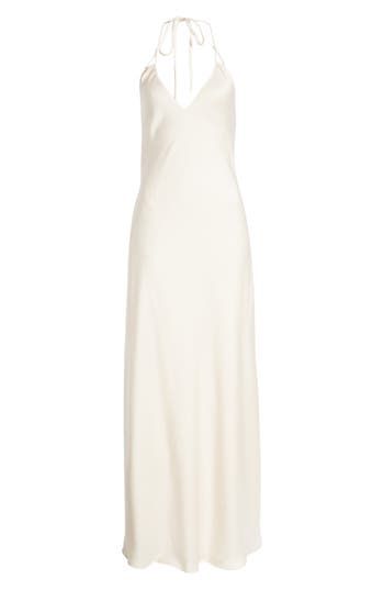 A full-length slipdress is designed with a halter neckline to create a night-out look of sweet simplicity that still makes a statement. Ties behind neck Halter neck Lined 100% polyester Dry clean Imported Spring Bias Cut Slip Dress For Wedding Night, Spring Bias-cut Slip Dress For Wedding Night, Elegant Bias Cut Halter Dress For Date Night, Spring Wedding Night Slip Dress With Bias Cut, Chic Solid Color Bias Cut Slip Dress, Summer Wedding Bias Cut Halter Dress, Halter Neck Bias Cut Slip Dress For Wedding, Wedding Slip Dress Halter Neck Bias Cut, Classic Bias Cut Slip Dress For Night Out