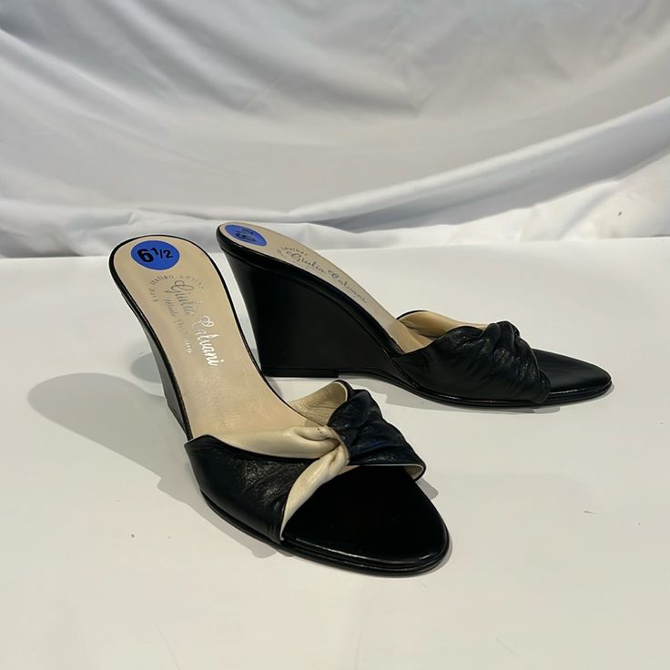 Very Pretty, Never Worn Italian Leather Wedge Slides. Soft Cream And Black Leather In A Size 6.5. The Wedge Heel Measures Approximately 3.5” High. Elegant Slip-on Wedge Sandals For Spring, Elegant Evening Wedge Sandals Medium Width, Elegant Medium Width Wedge Sandals For Evening, Vintage Formal Heels In Synthetic Material, Elegant Slip-on Wedge Sandals For Formal Occasions, Formal Wedge Sandals For Spring, Spring Formal Wedge Heel Sandals, Vintage Synthetic Heels For Formal Occasions, Spring Formal Wedge Sandals