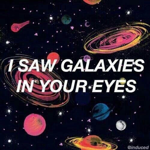 the words i saw galaxy in your eyes on a background of colorful planets and stars