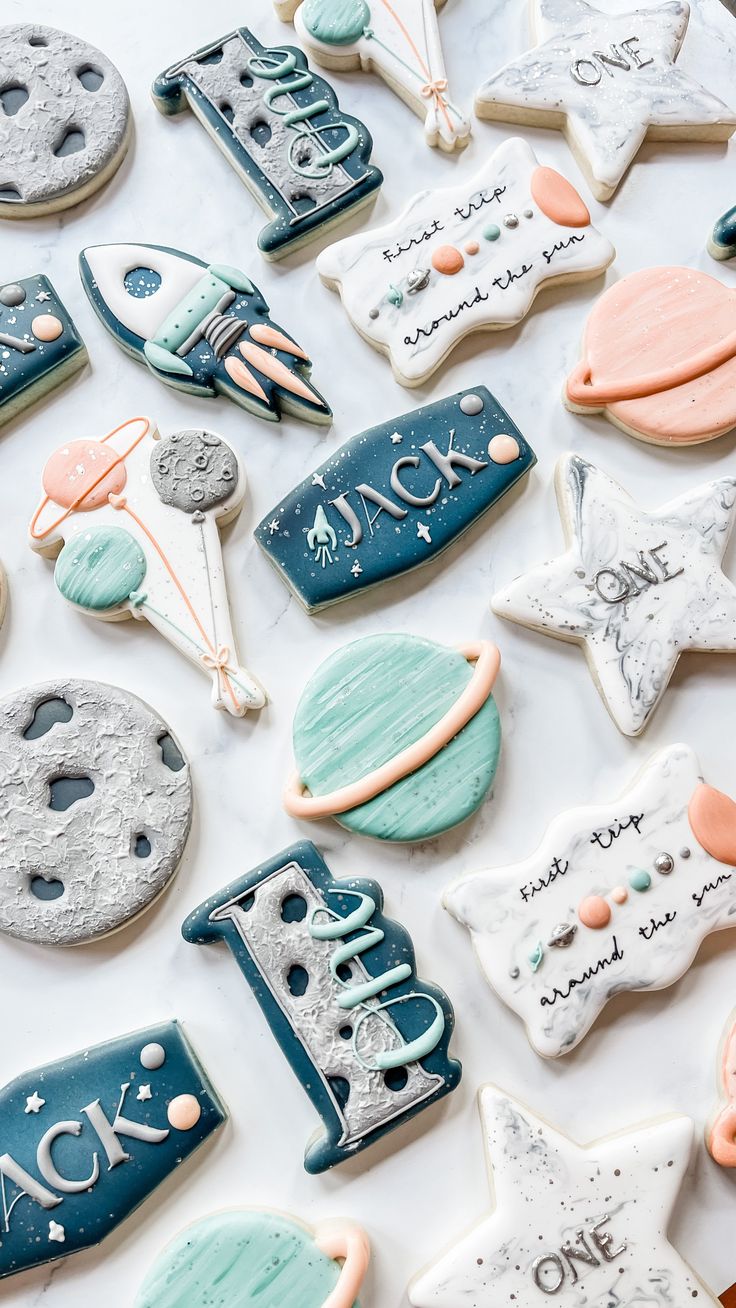 decorated cookies are laid out on a table