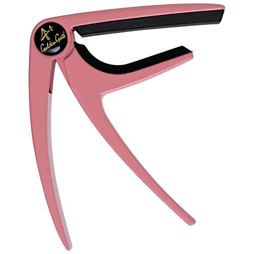 a pink pair of scissors with black handles and logo on the front, against a white background