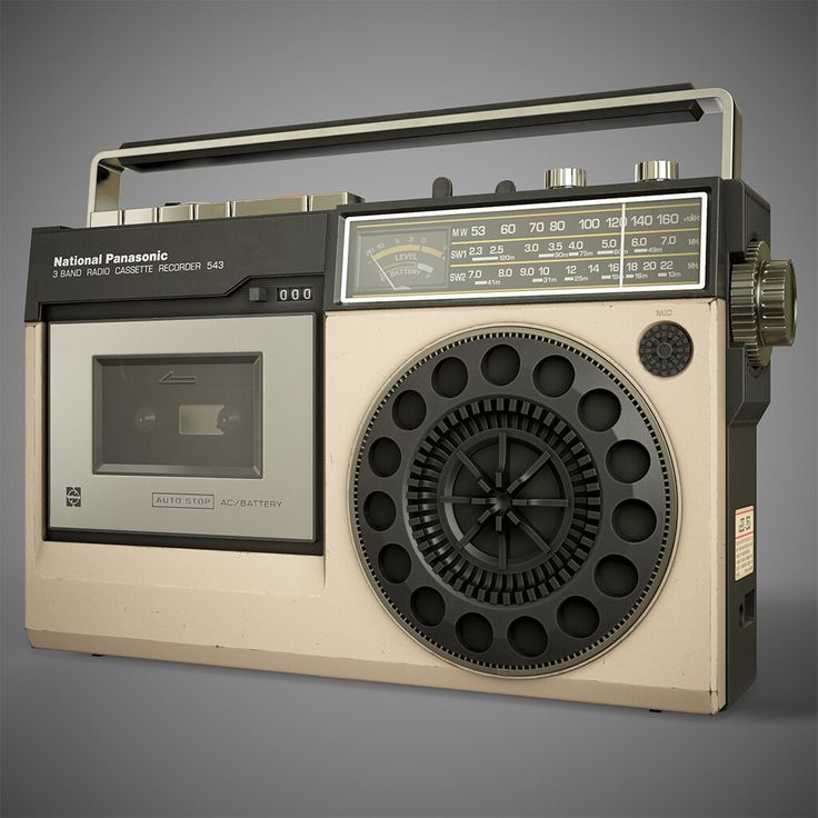 an old fashioned radio with a clock on it's front and side panel is shown