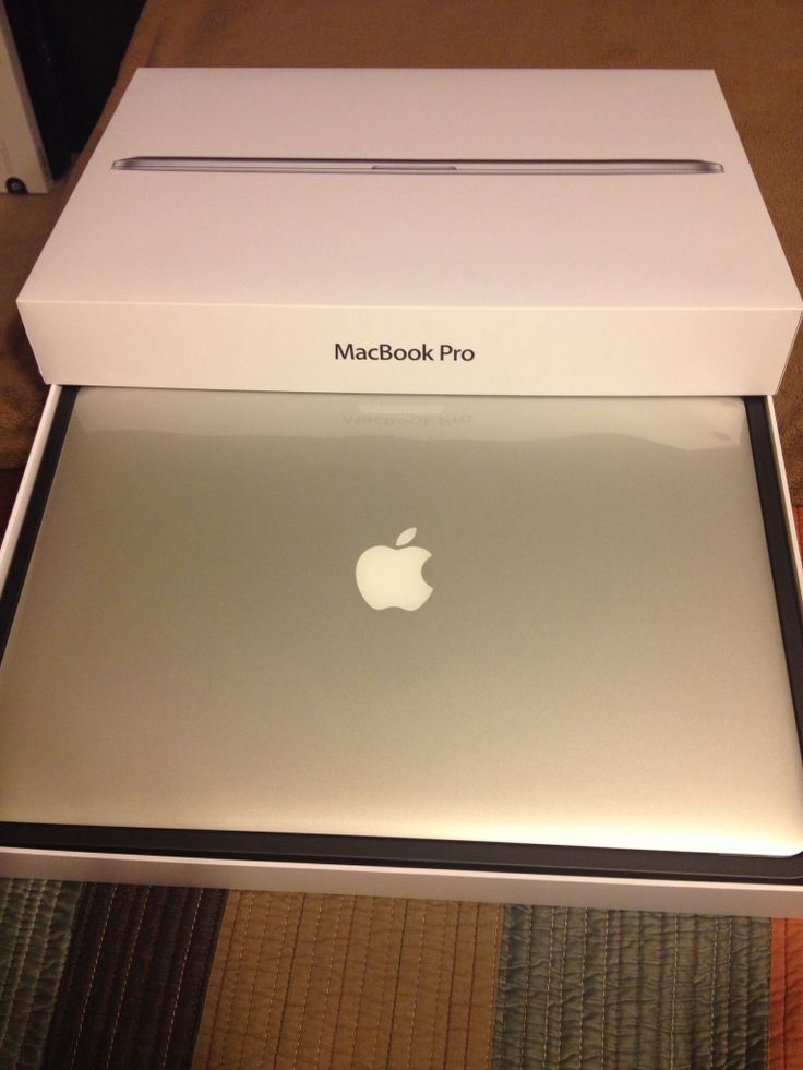 an apple macbook pro in its box