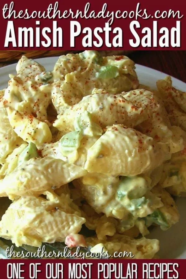 a white plate topped with pasta salad next to a red and white sign that reads, one of our most popular recipes