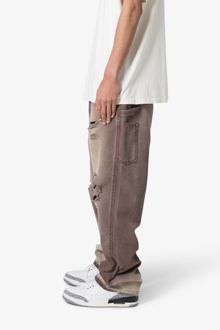 the Ultra Baggy Work Pants are designed with a new oversized ultra baggy fit, constructed from denim with a heavy wash and sanding, distressing at the knees, featuring standard work denim details, and finished with a button placket. details ultra baggy fit throughout 100% cotton extended inseam model is 6’1, 140 lbs and wears a size 30 Baggy Brown Jeans With Five Pockets, Brown Straight Leg Cargo Jeans For Streetwear, Urban Washed Straight Leg Cargo Jeans, Urban Straight Leg Washed Cargo Jeans, Baggy Brown Straight Leg Jeans, Casual Baggy Distressed Cargo Pants, Brown Baggy Straight Leg Jeans, Distressed Dark Wash Cotton Pants, Baggy Distressed Rigid Denim Jeans