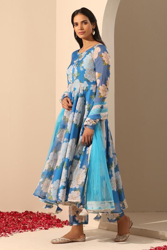 Blue anarkali crafted in organza in floral pattern. Paired with apant and soft net dupatta.
Components: 3
Pattern: Embroidered
Type Of Work: Lace
Neckline: Round
Sleeve Type: Long
Fabric: Anarkali: Organza, Pant: Cotton, Dupatta: Soft Net
Color: Blue
Other Details: 
Length:
Anarkali: 48 inches
Pant: 38 inches
Dupatta: 2.5 mtrs
Dupatta width: 44 inches
Occasion: Mehendi and Haldi - Aza Fashions Blue Anarkali, Cotton Dupatta, Lace Neckline, Net Dupatta, Pants Pattern, Pant Set, Embroidered Lace, Set For Women, Anarkali