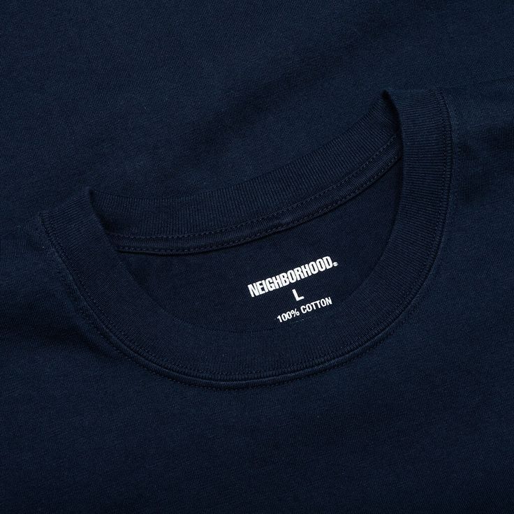 The NH. TEE SS-12 in a navy is crafted from breathable cotton for all-day comfort. This tee has a regular fit and a classic crew neck, making it a go-to choice for casual outings. The screen-printed graphic on the back adds a cool element to your look. Perfect for pairing with your favorite jeans or shorts. 100% Cotton Regular fit Crew neck Screen printed graphic on the back Style No: 232PCNH-ST12 Favorite Jeans, Shoulder Sleeve, Graphic Prints, Screen Printing, The Neighbourhood, Tee Shirts, Crew Neck, Screen, Navy