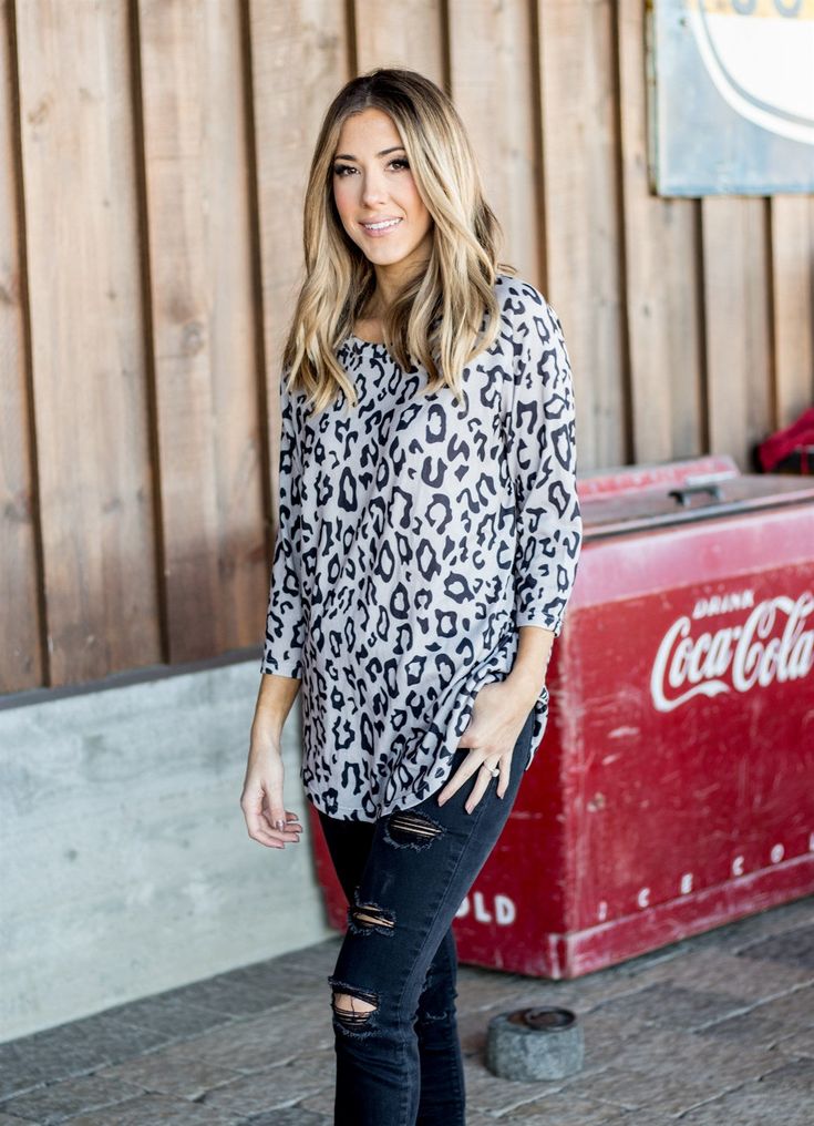 Introducing the Blair Top, the perfect addition to your wardrobe this season! With its simple yet relaxed style, this top is both flattering and comfortable, making it a must-have for any fashion-forward woman. The neutral animal print adds a touch of fierceness to your everyday look, making you stand out in the best way possible. Size: Small 0-4 Medium 6-8 Large 10-12 XL 12-14 1X 14-16 2X 16-18 3X 18-20 Casual Leopard Print Tops For Day Out, Casual Long Sleeve Tiger Print Tops, Fall Tiger Print Tops, Chic Fall Tiger Print Tops, Trendy Tiger Print Tops For Fall, Casual Tiger Print Tops, Leopard Print Relaxed Fit Top For Fall, Leopard Print Top With Relaxed Fit For Fall, Leopard Print Tops With Relaxed Fit For Fall