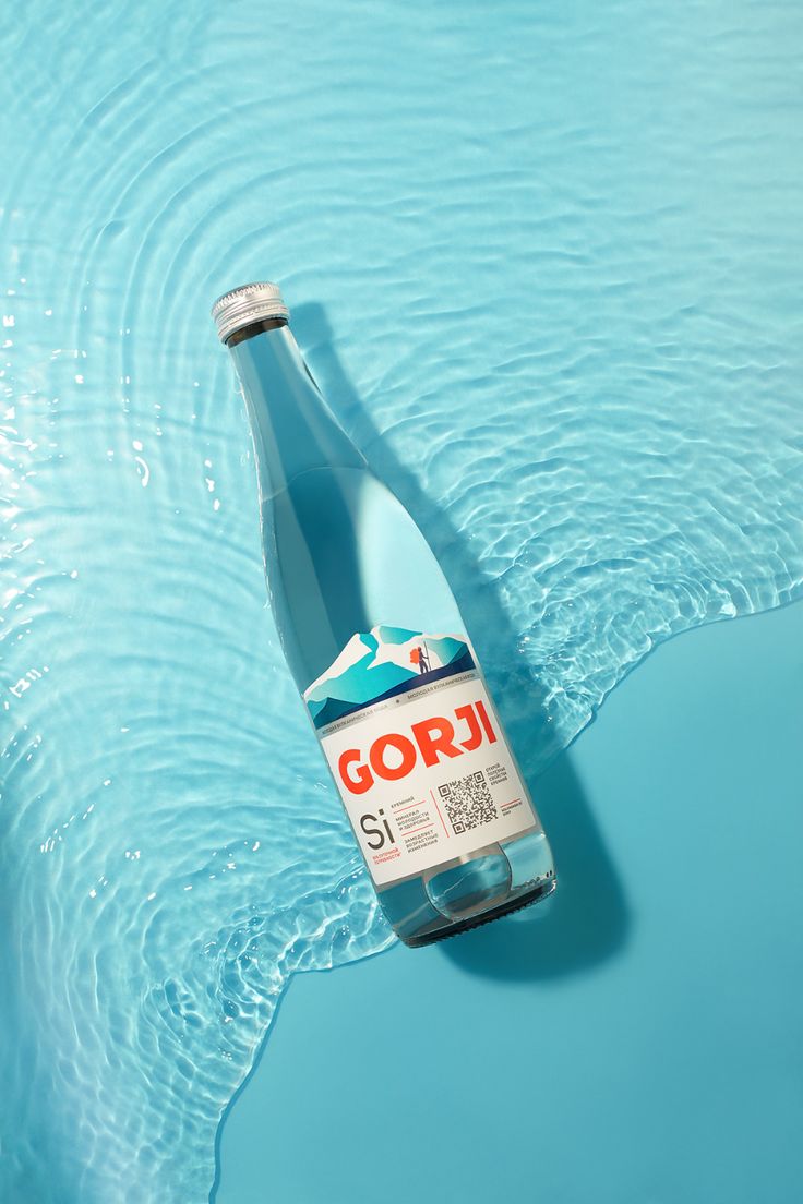 a bottle of gori is floating in the water