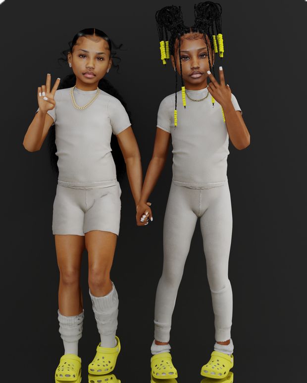 two dolls are posed in front of a black background holding hands and making the peace sign