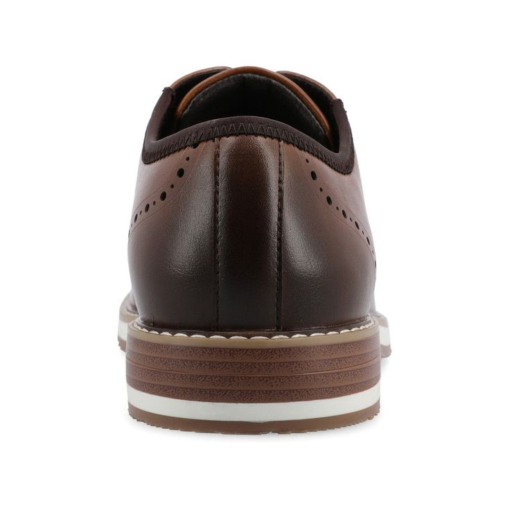 Introducing the Ozzy derby by Vance Co. These classic shoes are made with high-quality vegan leather, offering a professional and timeless style. With a comfortable 12 mm Tru Comfort Foam™ insole and a lace-up design, they provide all-day comfort and a secure fit. The 1-inch block heel, round-toe shape, and wingtip detailing add a touch of sophistication to the Ozzy derby, making it a versatile and stylish choice Platform Block Heels, Closed Toe Shoes, Dress Shoe, Round Toe Heels, Women Men Shoes, Classic Shoes, Lace Up Shoes, Timeless Style, Shoe Collection