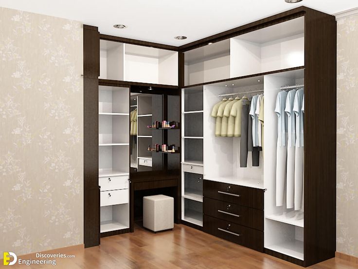 an open closet with clothes and other items