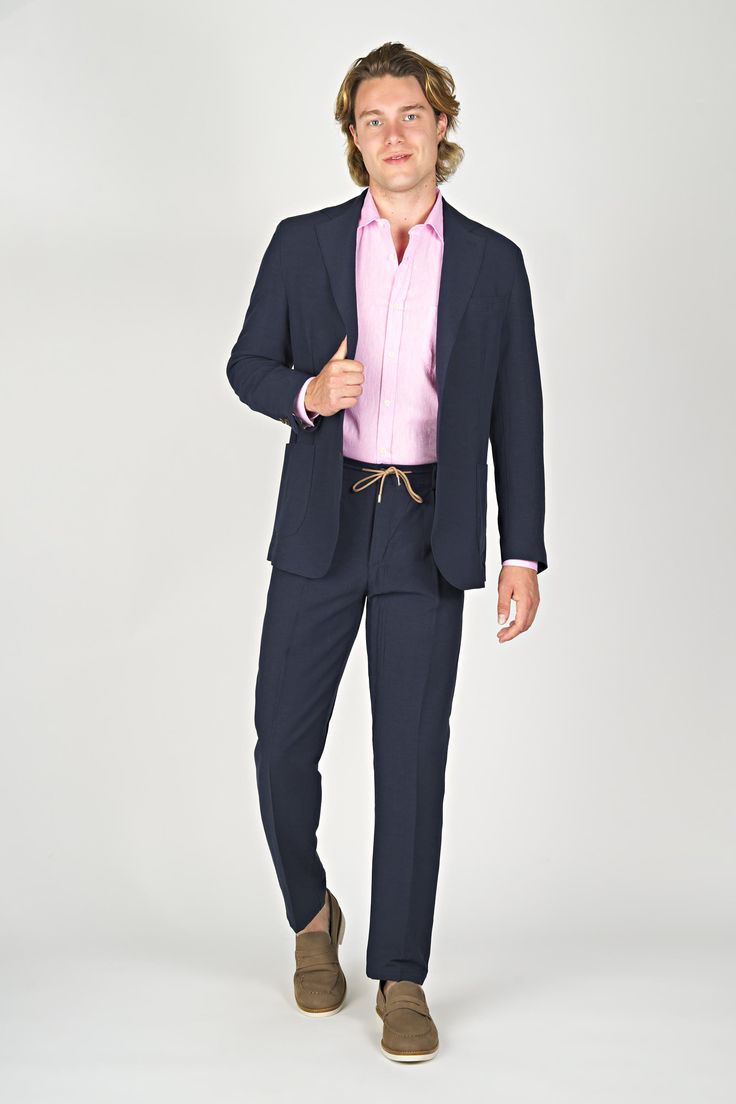 Expertly crafted with a blend of cotton and linen, this unlined jacket features a two-button closure and notched lapels for a classic and sophisticated look. Experience the comfort and breathability of natural fibers, making it the perfect choice for any occasion. Notch Lapel Linen Blazer For Formal Occasions, Business Casual Linen Blazer With Patch Pockets, Linen Blazer With Patch Pockets For Business Casual, Lapel Collar Linen Suit For Work, Business Casual Linen Blazer With Concealed Placket, Linen Suits With Lapel Collar For Work, Linen Suit With Lapel Collar For Work, Linen Blazer For Business Casual, Unstructured Blazer For Business In Spring