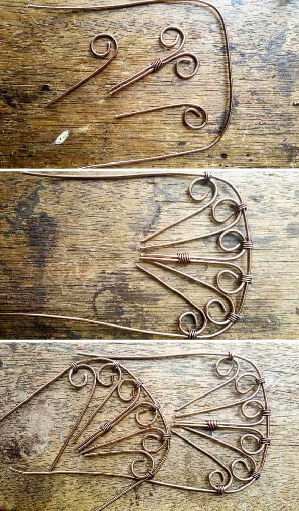 three different types of scissors are shown on the wooden floor, and one is made out of metal wire