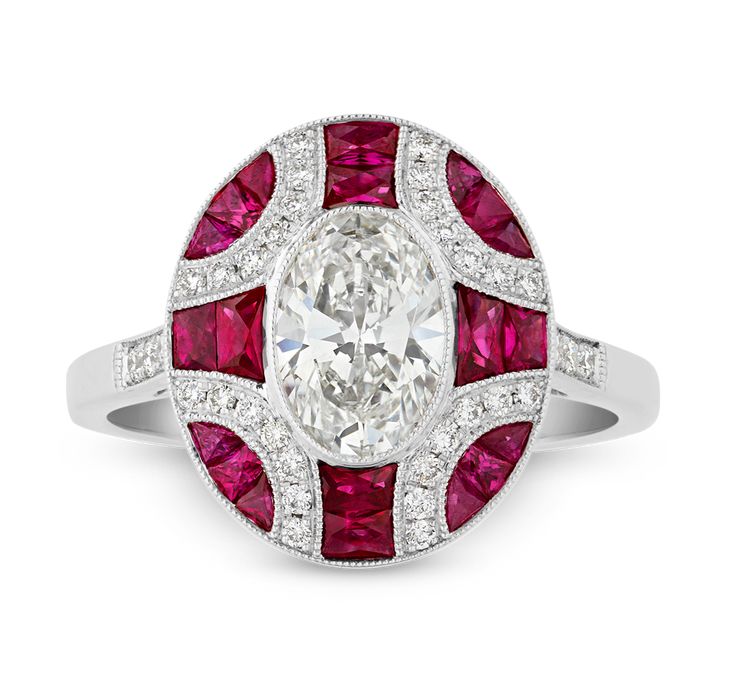 This exquisite Art Deco-style cocktail ring is centered by an oval-cut diamond weighing 1.00 carat, certified by the Gemological Institute of America as having exceptional E color and VS2 clarity. The center stone is complemented by the rich, vibrant hues of accent rubies totaling 0.65 carat and additional diamonds with a combined weight of 0.17 carat, all distributed in a unique geometric pattern. Illustrating all of the Art Deco era’s most marvelous characteristics, this harmonious blend of co Diamond And Ruby Ring, Rare Jewelry, Oval Cut Diamond, Art Deco Diamond, Art Deco Era, Art Deco Ring, Ruby Ring, Blue Diamond, Everyday Jewelry