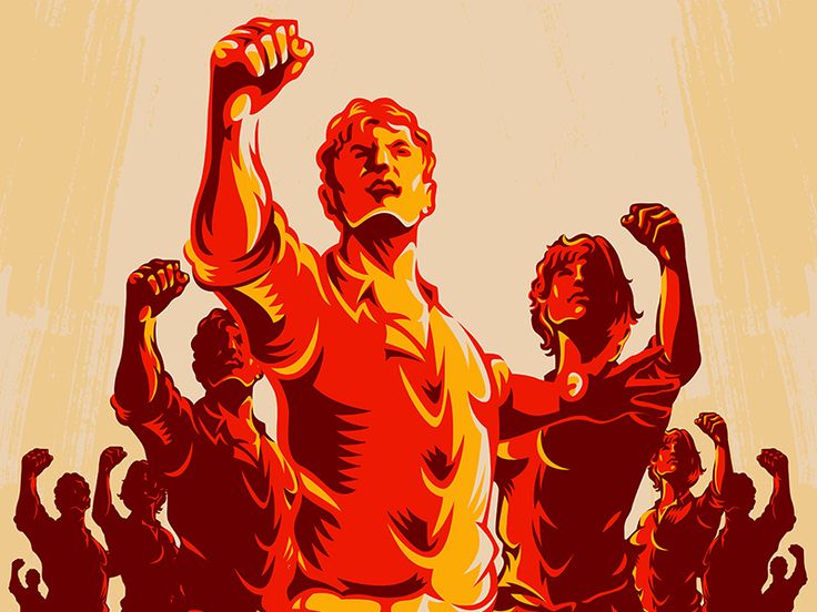 an image of a man raising his fist in the air with other people behind him