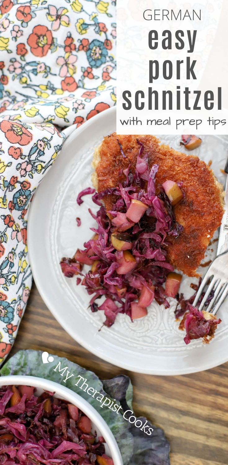 a white plate topped with red cabbage and meat